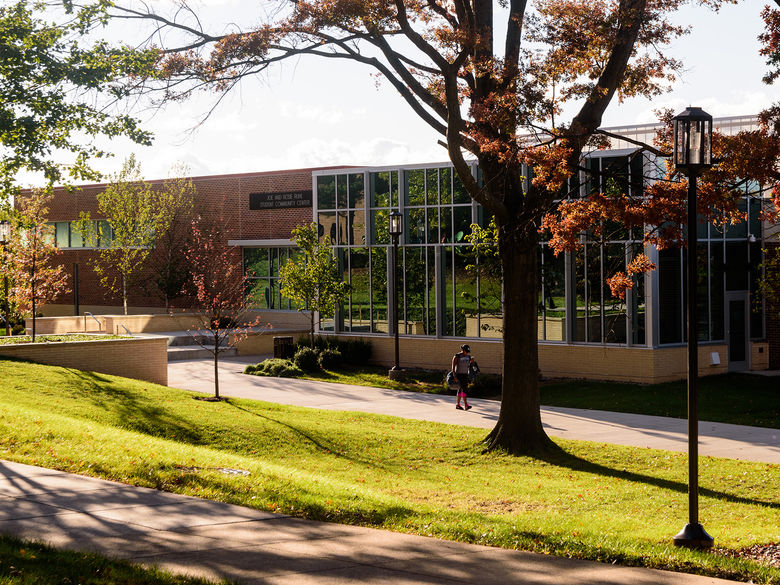 A student walking on campus