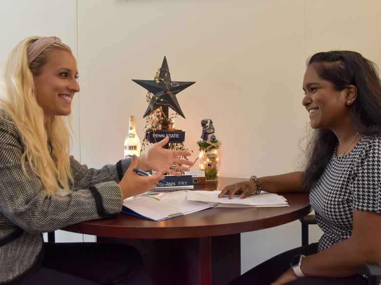 A student meeting with staff in the Advising and Career Development Office.