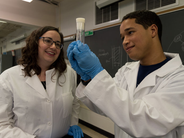 Professor Petko with a studentt in the biology labs.