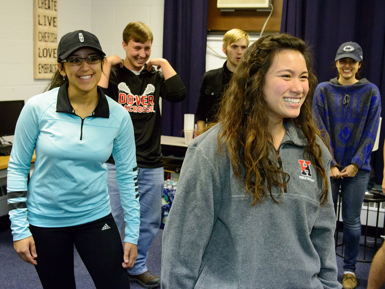 Students participating in team-building activities during an orientation event