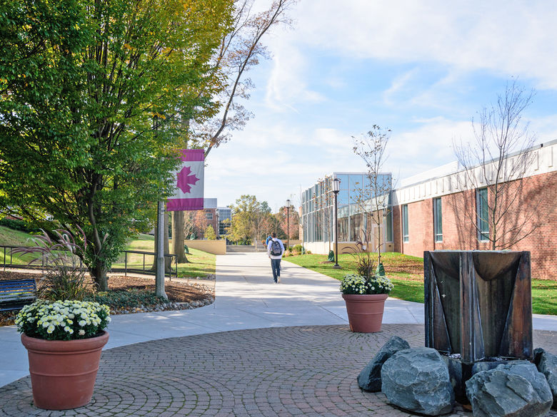 Photo of flowers and fountain outside the Joe and Rosie Ruhl Student Community Center