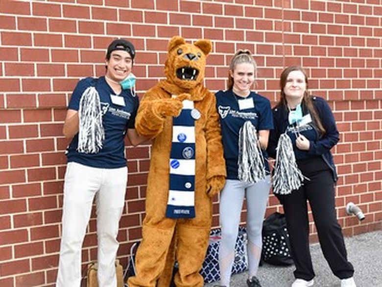 Students with the Nittany Lion mascot
