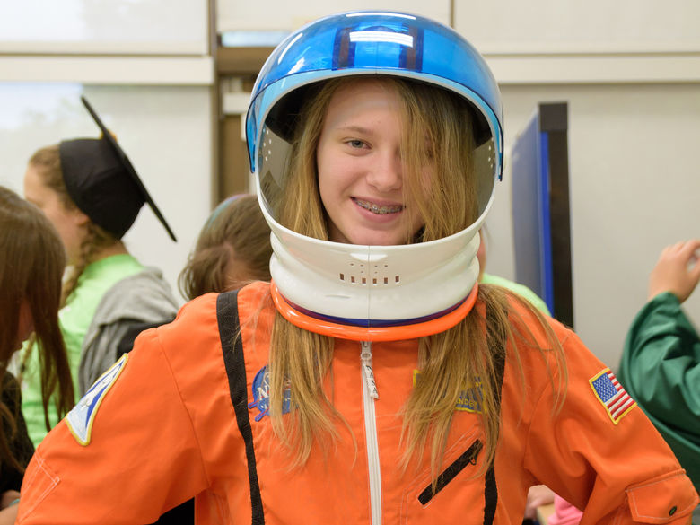 A student wearing an astronaut outfit during the Pathways program.