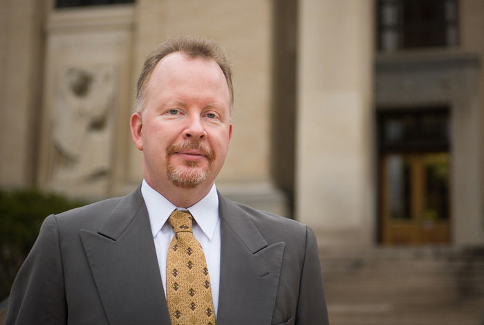 Mark Brennan stands on the Penn State University Park campus.