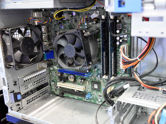 The internal workings of an old PC workstation.