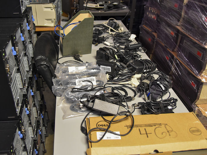 Wires and other electronic components spread out on tables