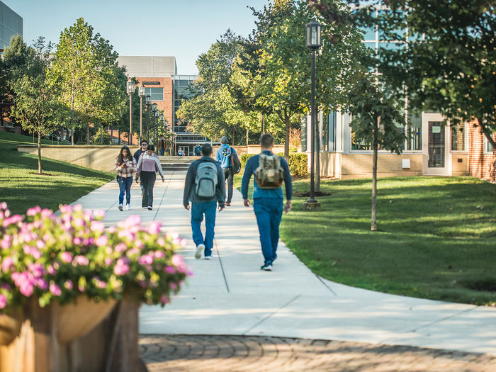 Students walking on campus.