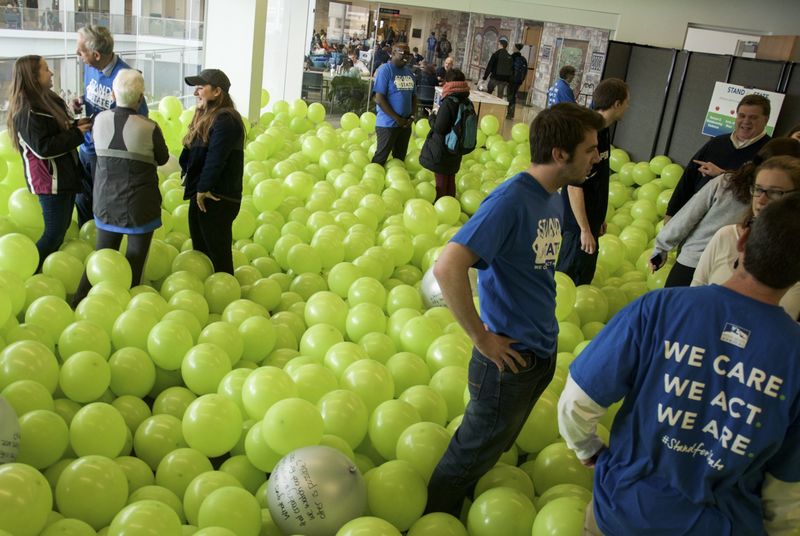 Students and staff talking in the Balloon Room 