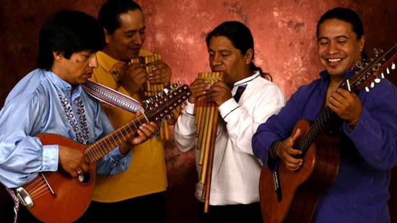 Four musicians with their handmade instruments