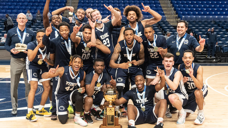 Parrish Petry and the York men's basketball team after the PSUAC championship game