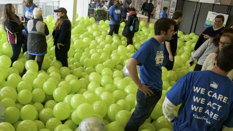 Students and staff talking in the Balloon Room 