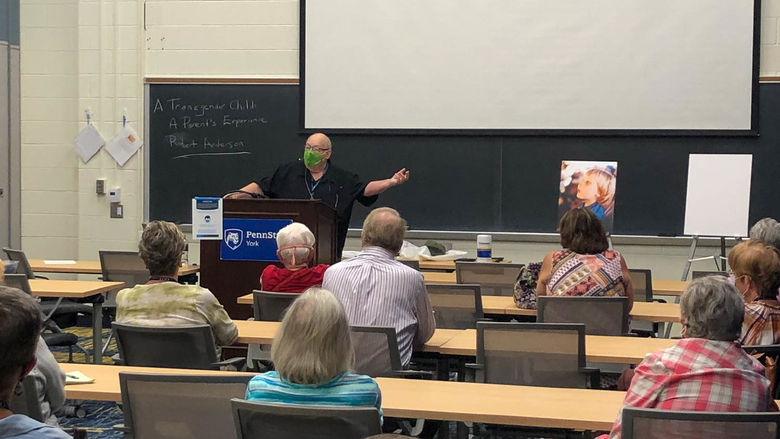 OLLI class being taught by faculty member wearing a mask