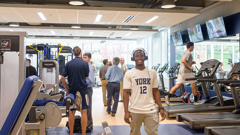 Students and staff use the new fitness center.