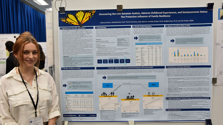 Gianna Gomes, an HDFS student, presenting her research on the link between autism, childhood experiences, and socioeconomic status.