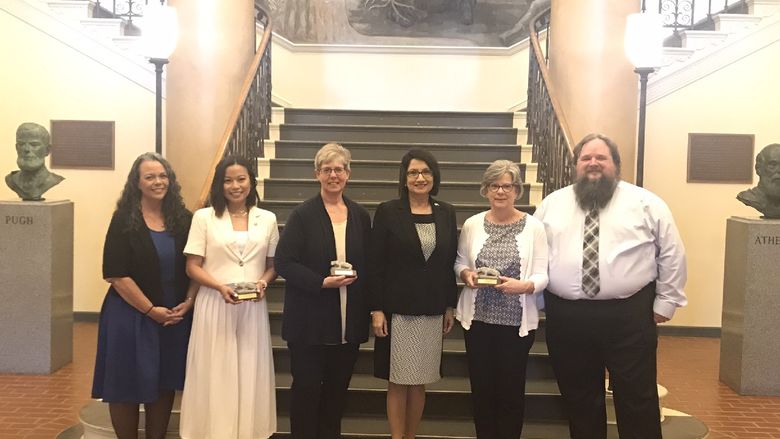 The three recipients of the 2022 USAC awards with USAC leadership and Penn State President Neeli Bendapudi