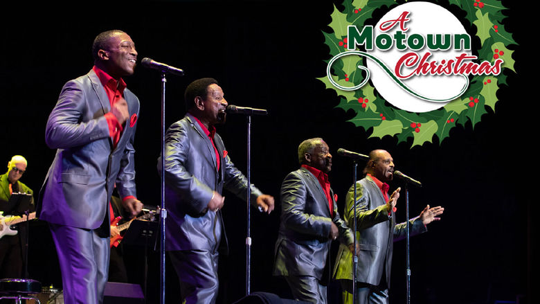 Four singers performing at microphones with the words A Motown Christmas