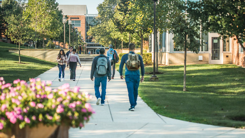 Students walking on campus.