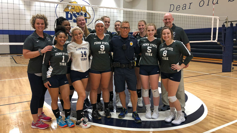 Penn State York volleyball team with office Dwayne Smith