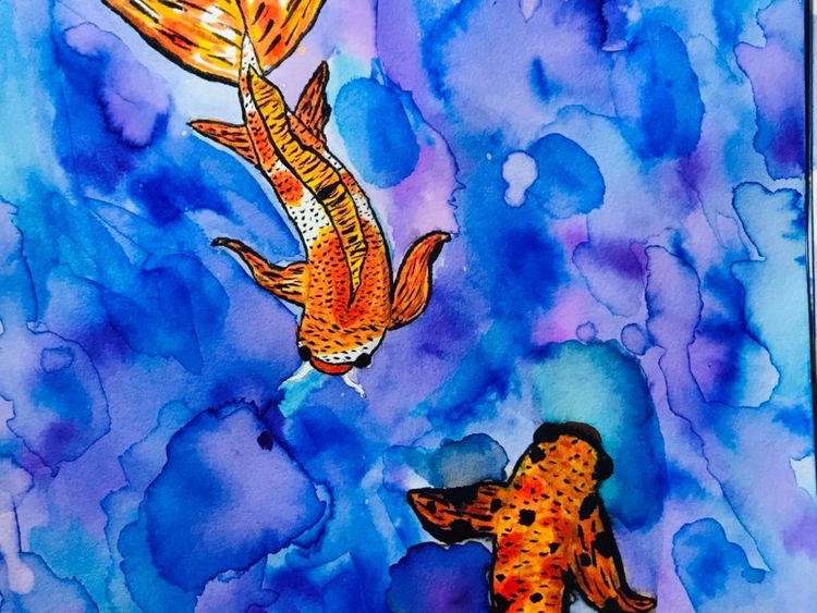 Watercolor painting of orange-colored fish swimming on a colorful background