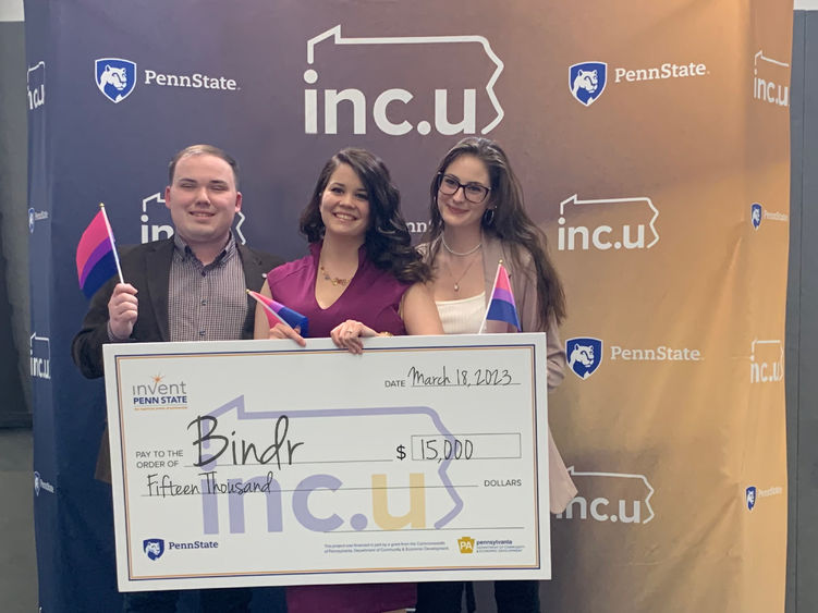 Founders of Bindr with large check